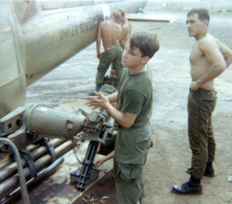 Dennis Brault preflighting a Huey