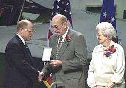 Mr Pitsenbarger receives his son's Medal of Honor