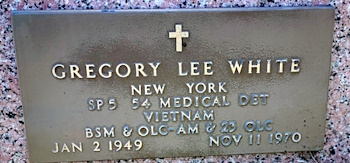 Gregory L White