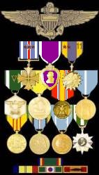 DFC (4 awards), Purple Heart, Air Medal (3 Strike/11 Flight), Navy Commendation, and lesser awards.